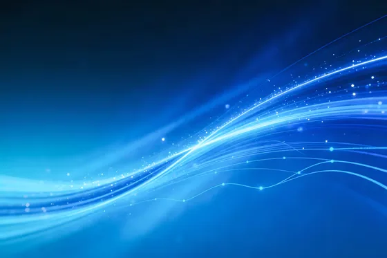 Blue flowing light wave technology background