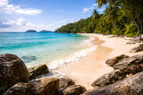 Sandy Beach With Large Rock In The Fore