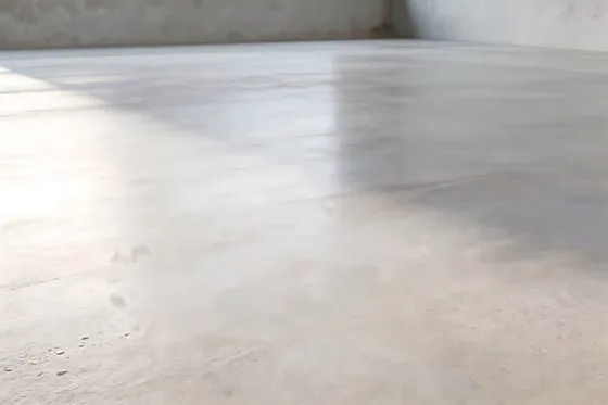 Skateboarder Is Riding On A Concrete Surface