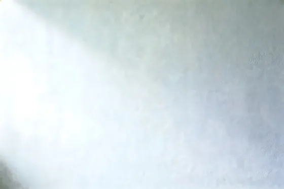 Man In A White Shirt Is Playing A Game