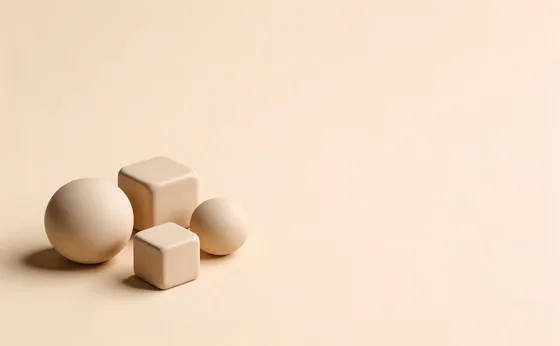 Three Eggs On A Beige Background