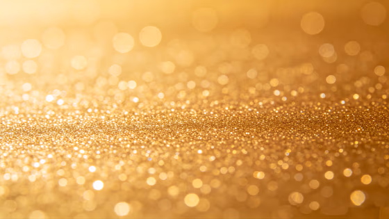 Luxurious rich golden glitter sparkling and shimmering