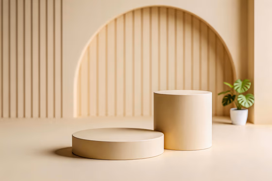 Elegant minimalist product display podiums on warm beige studio background
